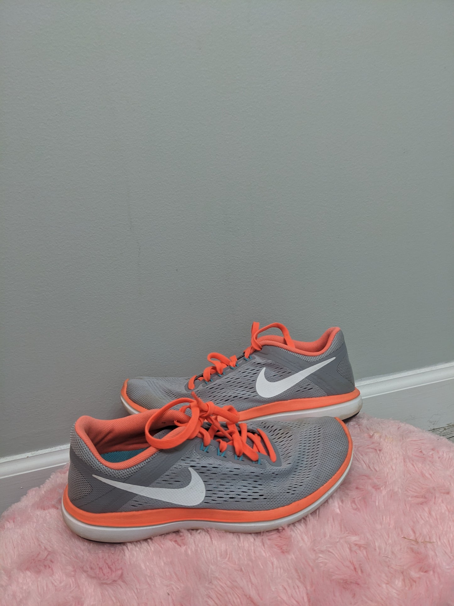 Orange and white Nike size 6c